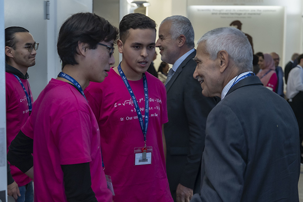 Adnan with students